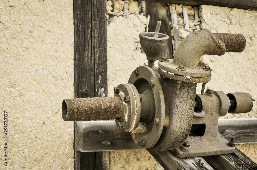 Old rusty machinery with pipes