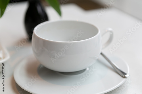 White empty tea cup in restaurant 