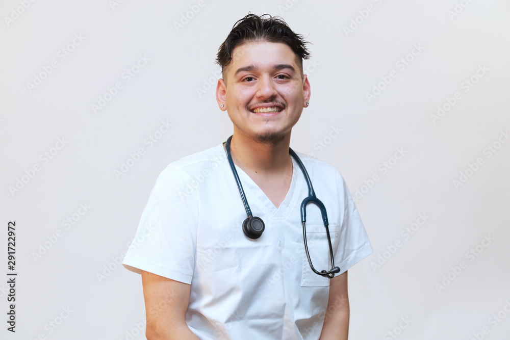 Portrait of a young hispanic male healthcare professional, portrait of a medical intern Portrait of a young hispanic male healthcare professional, portrait of a medical intern
