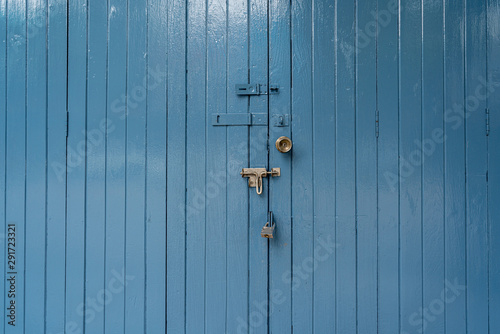 old wooden door with a lock