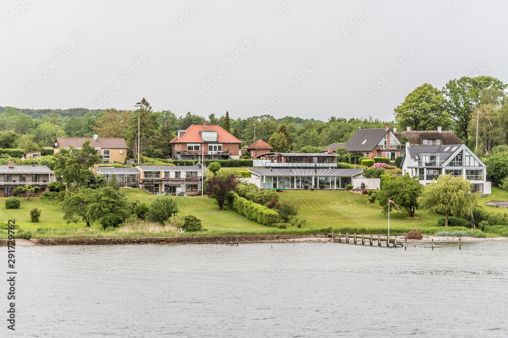 seafront houses along the beach at the inlet to Svendborg seafront houses along the beach at the inlet to Svendborg