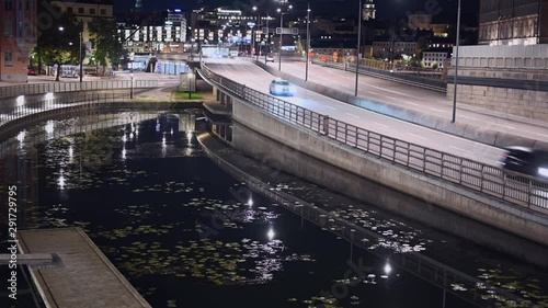 Traffic on Central Bridge in Stockholm at night photo