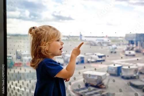 Photography Cute little toddler girl at the airport, traveling