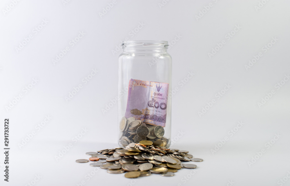 Saving money, saving money for the future ahead of life. And silver on a white background Saving money, saving money for the future ahead of life. And silver on a white background