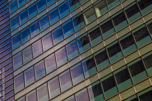 Window office building in Tokyo city against blue sky with cloud