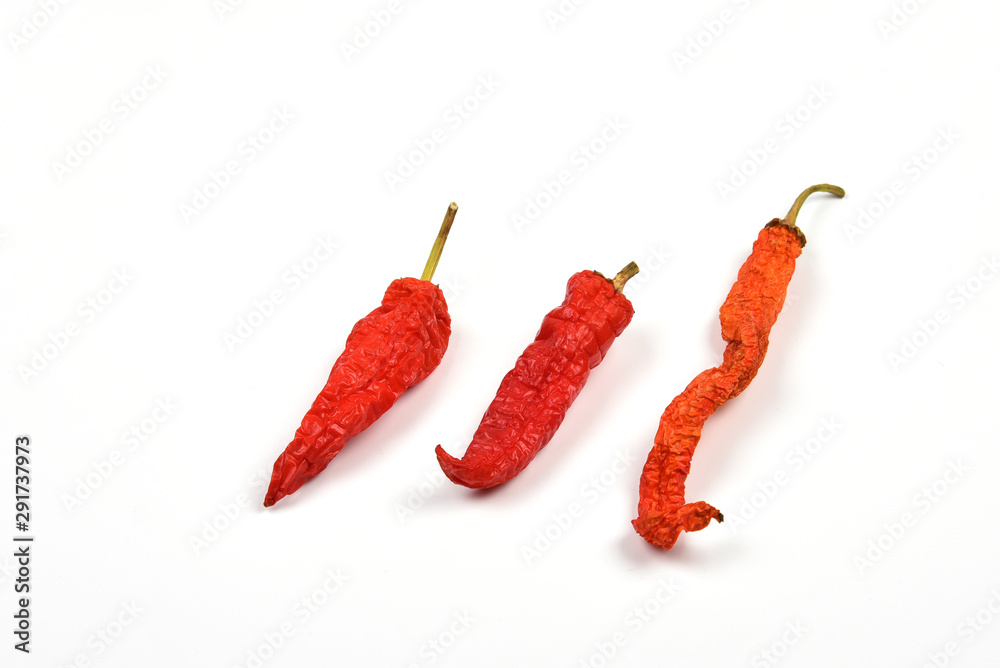 Chilli. Dried pods on a white background Chilli. Dried pods on a white background