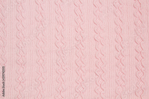 The fabric is a waffle knit pink. The texture of the knitted fabric