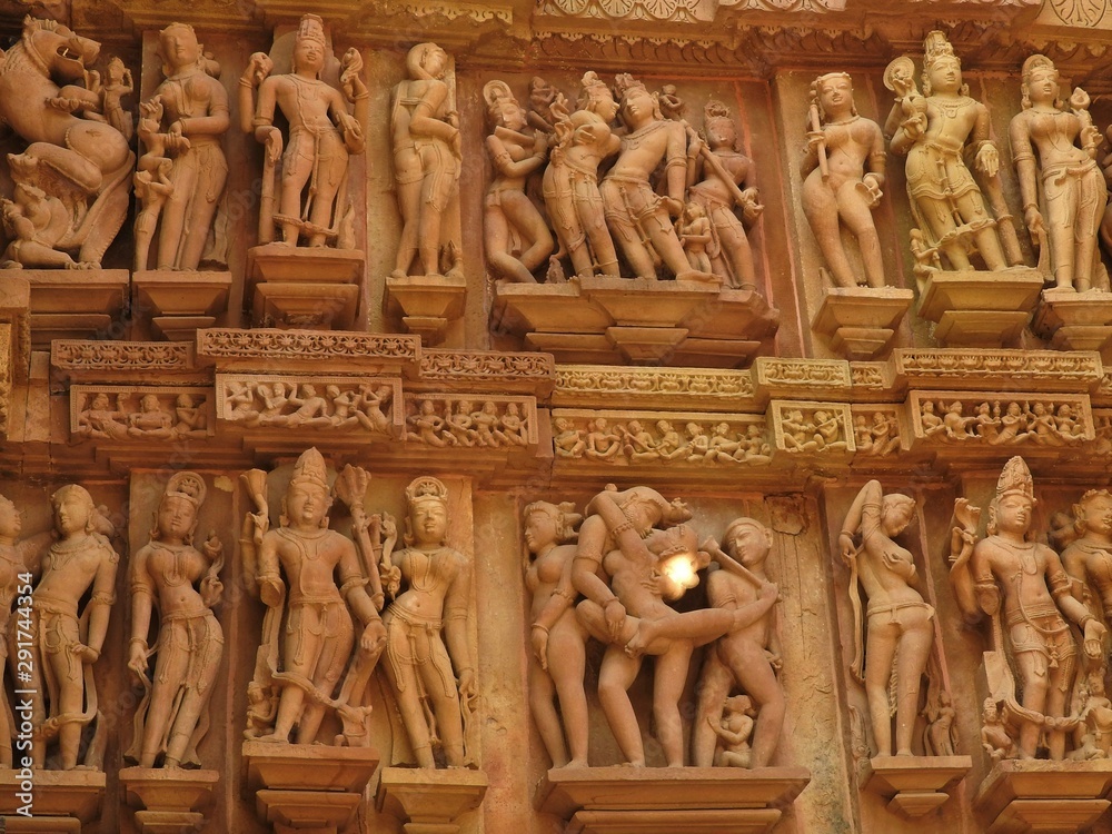 Ancient bas-relief at famous erotic temple in Khajuraho, India. Most Khajuraho temples were built between 950 and 1050 by the Chandela dynasty.
