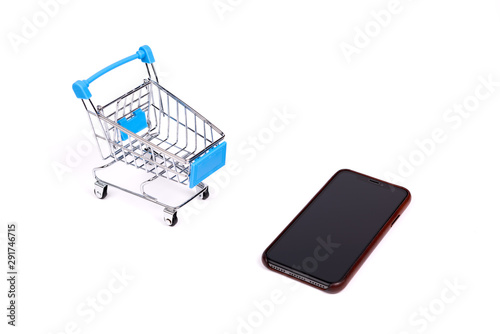 Smart phone with shopping cart on white background isolated