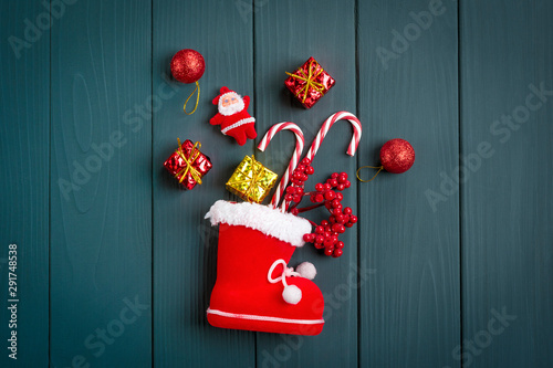Composition of Christmas red and golden decorations isolated on dark wooden background Happy new year 2020, Merry Christmas concept Flat lay Top view