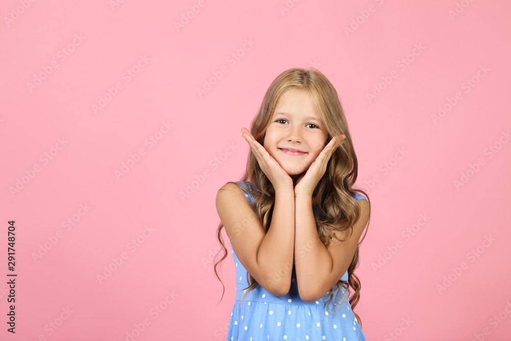 Pretty little girl on pink background Pretty little girl on pink background