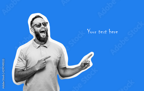 Hipster man pointing with fingers at your text. Crazy hipster guy emotions. Discount, sale, season sales. photo