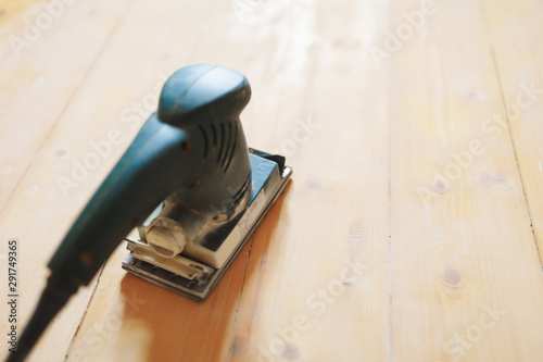 Tableau sur toile wooden floor sanding with flat sander tool