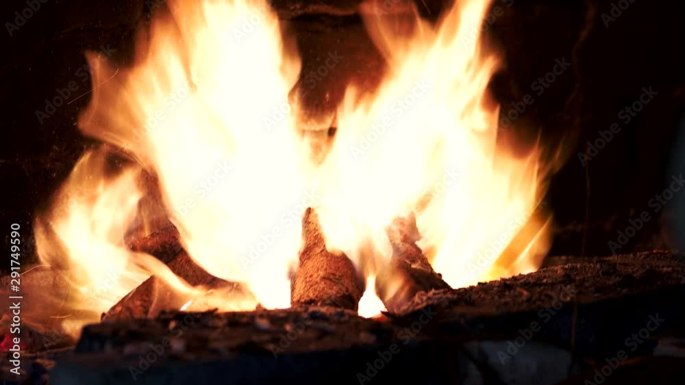 Fire forging in the blacksmiths workshop. Burning fire in furnace at forge. Craftsmanship and blacksmithing concept. Fire forging in the blacksmiths workshop. Burning fire in furnace at forge. Craftsmanship and blacksmithing concept.