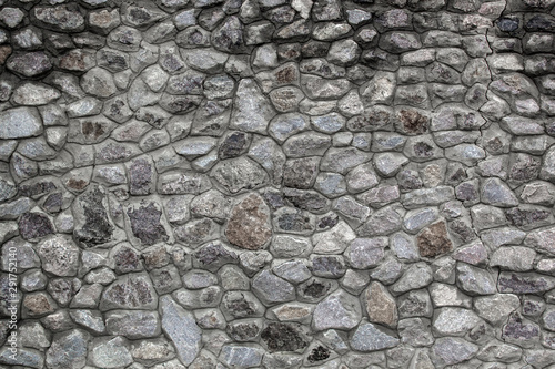 Texture of antique castle stone wall. Grey background for copy space