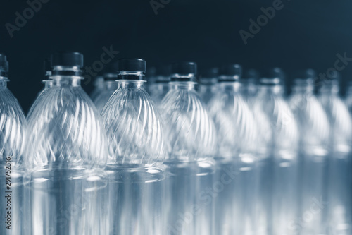empty plastic bottles on dark background