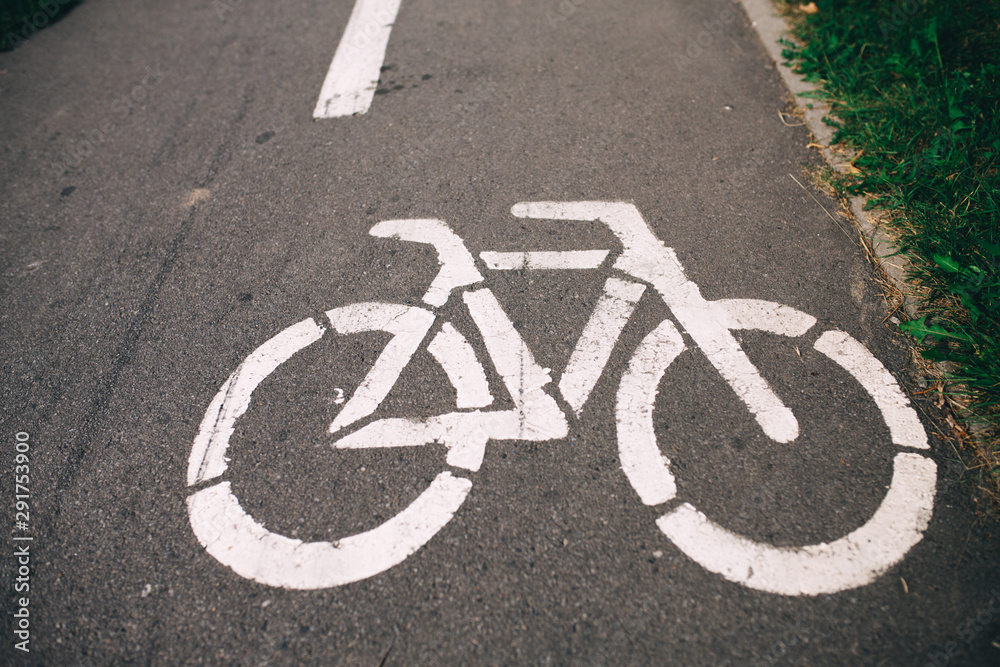 Bicycle lane for bike rider. Cycling path in the city. Bicycle road sign Bicycle lane for bike rider. Cycling path in the city. Bicycle road sign
