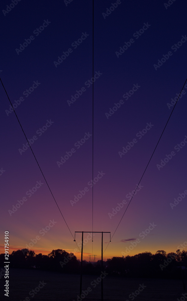Sunrise at power lines Ireland  