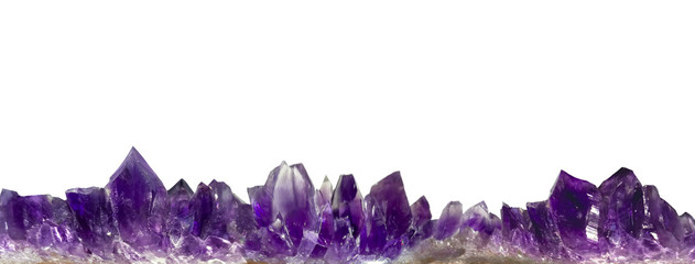 amethyst crystals border on white background