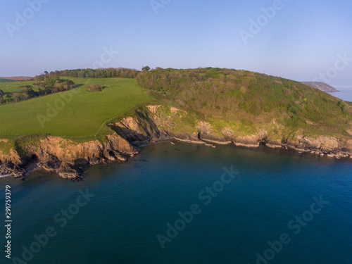 Aerial view of cove near Caerhays in Cornwall UK