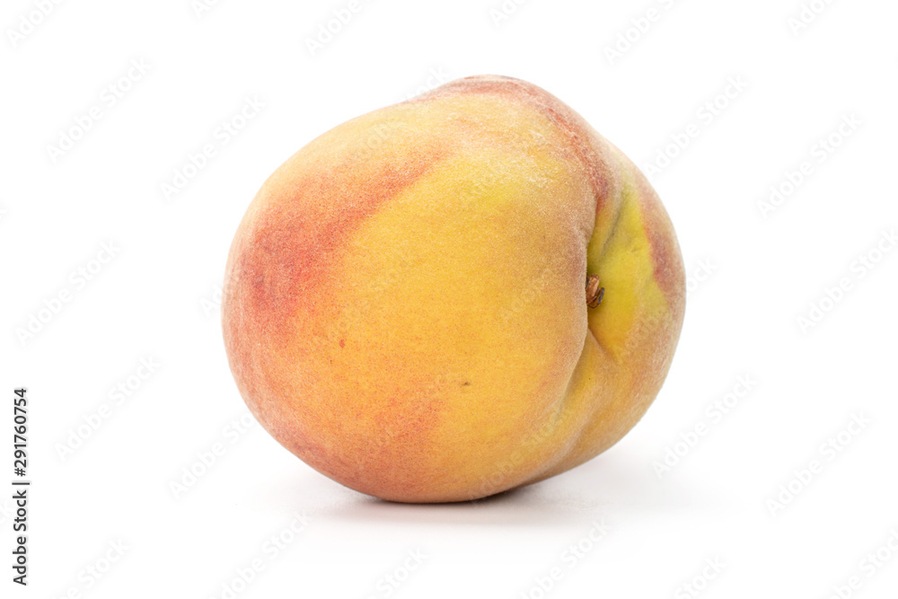 One whole yellow fresh fuzzy peach isolated on white background One whole yellow fresh fuzzy peach isolated on white background
