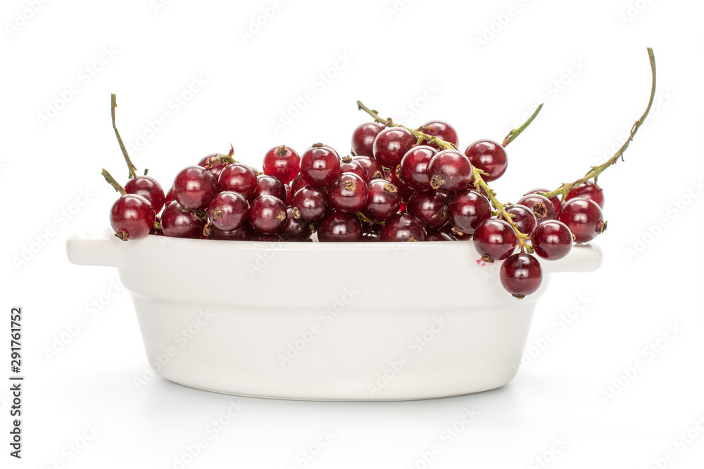 Lot of whole fresh dark redcurrant in ceramic stewpan isolated on white background Lot of whole fresh dark redcurrant in ceramic stewpan isolated on white background