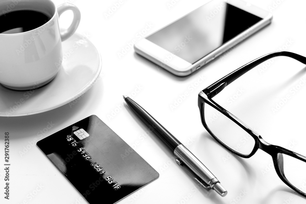 credit card, keyboard, smartphone and coffee cup on white background credit card, keyboard, smartphone and coffee cup on white background