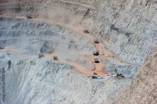 Big trucks and machinery at Chuquicamata, world's biggest open pit copper mine, Calama, Chile. Mining Operations at open pit Copper Mine near Calama, Northern Chile.  photo