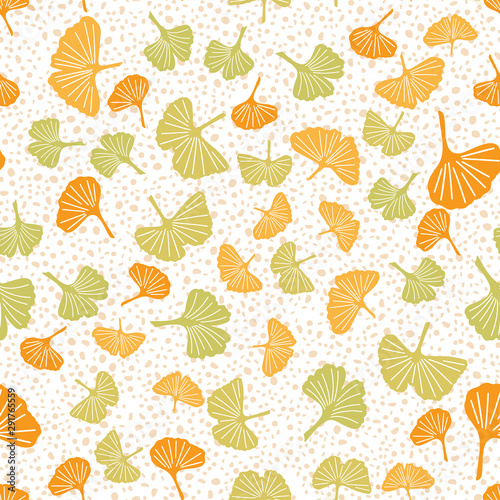 Endless pattern of ginkgo leaves and hand drawn dots. Vector seamless pattern for textile, wrapping paper, decoration, etc.