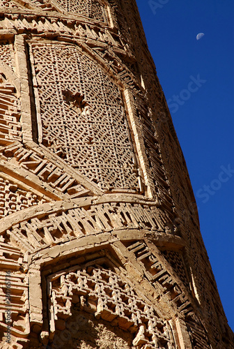 Minaret of Jam, Ghor Province in Afghanistan. The Jam minaret is a UNESCO site in a remote part of Central Afghanistan. The Minaret of Jam with detail of the geometric decoration and sky with moon. photo