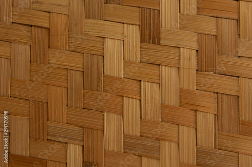 Traditional woven bamboo patterns  widely used for the walls of houses or simple stalls in rural Asia. But in cities  it is often used for decoration.