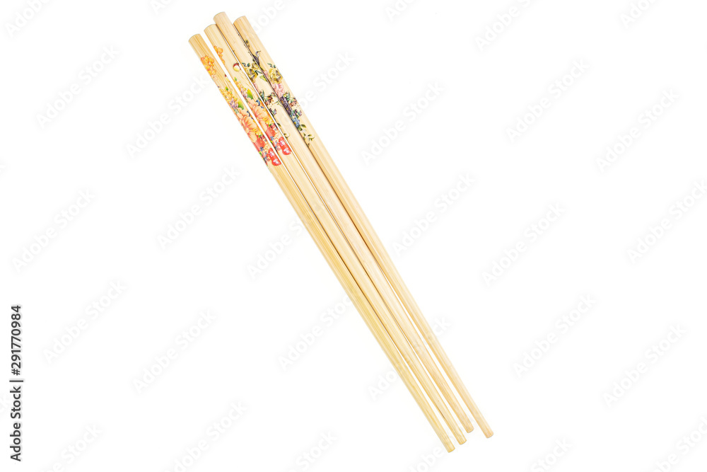 Group of four whole colorful asian brown chopsticks flatlay isolated on white background Group of four whole colorful asian brown chopsticks flatlay isolated on white background