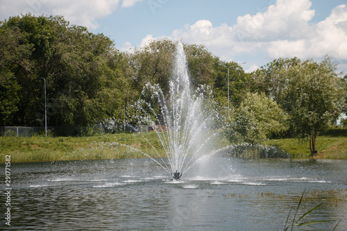 fountain in the lake in the country Park