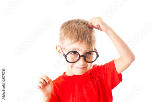 Kid in glasses isolated on white blackboard. Success, bright idea