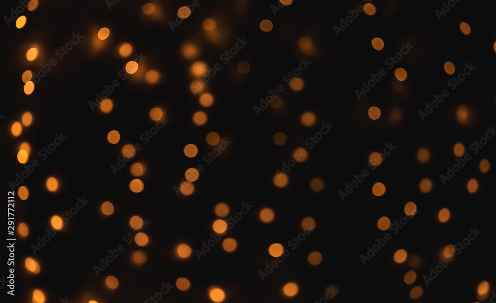 Abstract blurred shiny bokeh lights black background Abstract blurred shiny bokeh lights black background