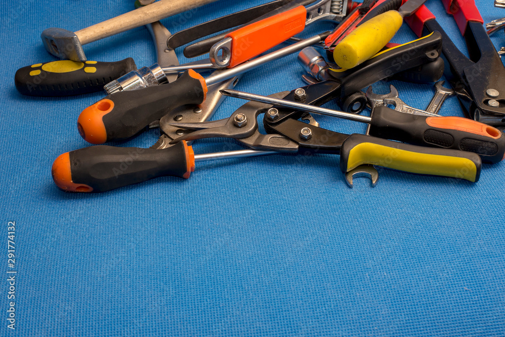 hand tool on a blue background hand tool on a blue background