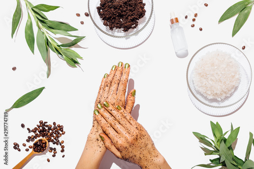 Woman's hands massaging natural homemade coffee scrub
