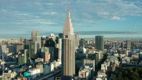alt day orbiting clockwise around DTT Docomo Yoyogi building in Shinjuku Tokyo photo