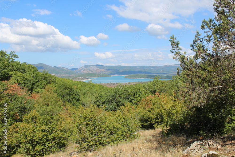 Panoramic view from the mountain to the reservoir
