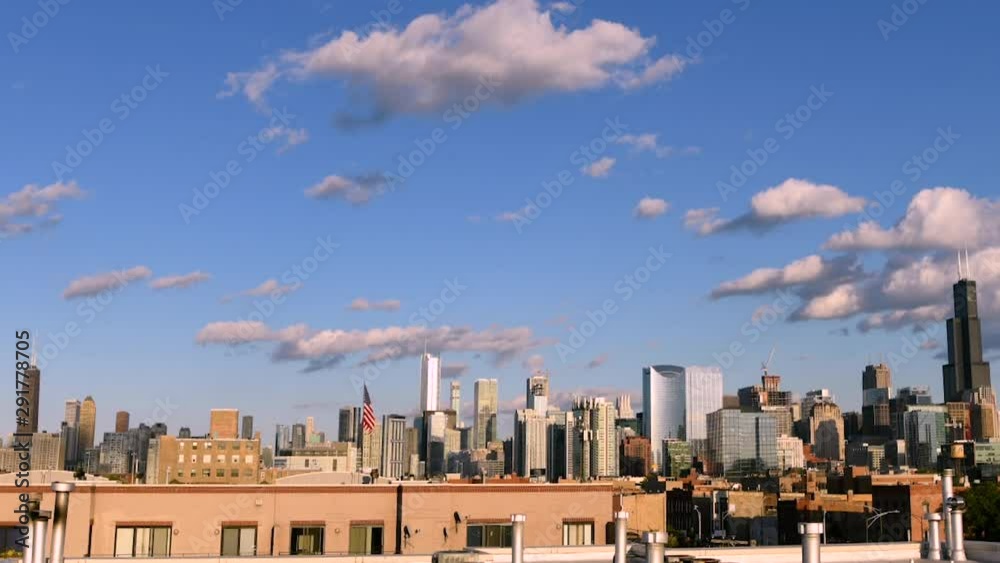 Time lapse video full Chicago skyline panorama, in the evening, when sunset changes the sky from blue to a deep, beautiful purple. Clouds passing in the sky. Time lapse video full Chicago skyline panorama, in the evening, when sunset changes the sky from blue to a deep, beautiful purple. Clouds passing in the sky.