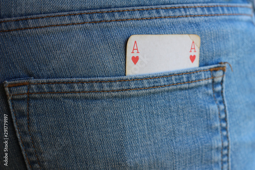Jeans with ace in the back pocket