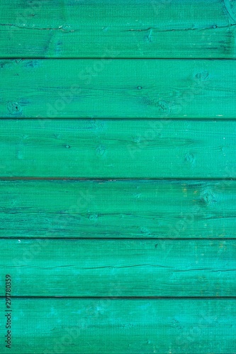 Green wooden background texture. Horizontal planks, bars