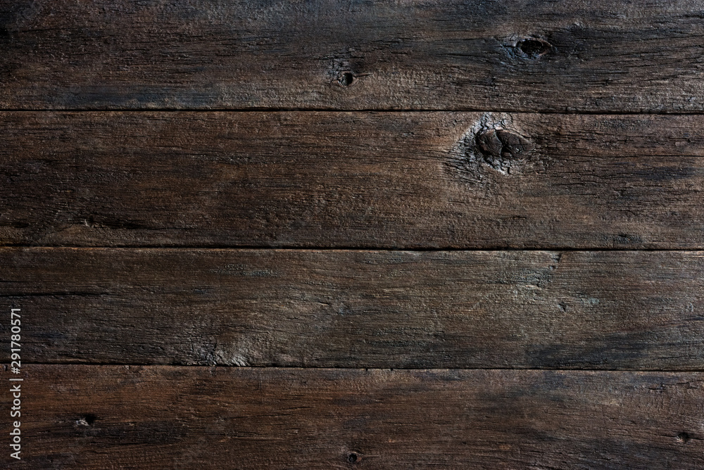 Old darkened wooden boards. Natural rustic background Old darkened wooden boards. Natural rustic background