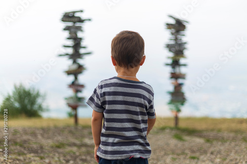 Choise and selfdetermination. A child beside pointer photo