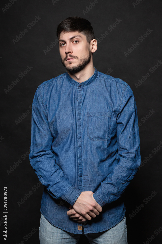 Attractive man posing in studio Attractive man posing in studio