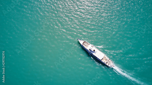 lake geneva ferry with blue water aerial