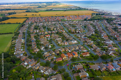 Aerial View of buildings and the mere in the seaside town of Hornsea during Summer of 2019