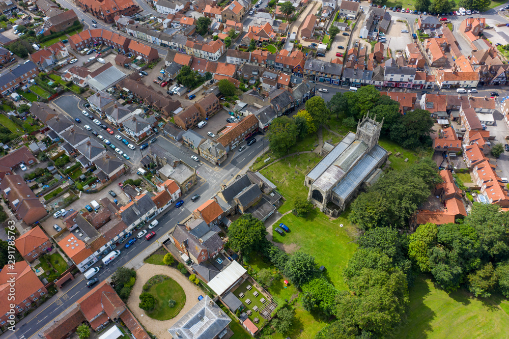 Aerial View of buildings and the mere in the seaside town of Hornsea during Summer of 2019 Aerial View of buildings and the mere in the seaside town of Hornsea during Summer of 2019