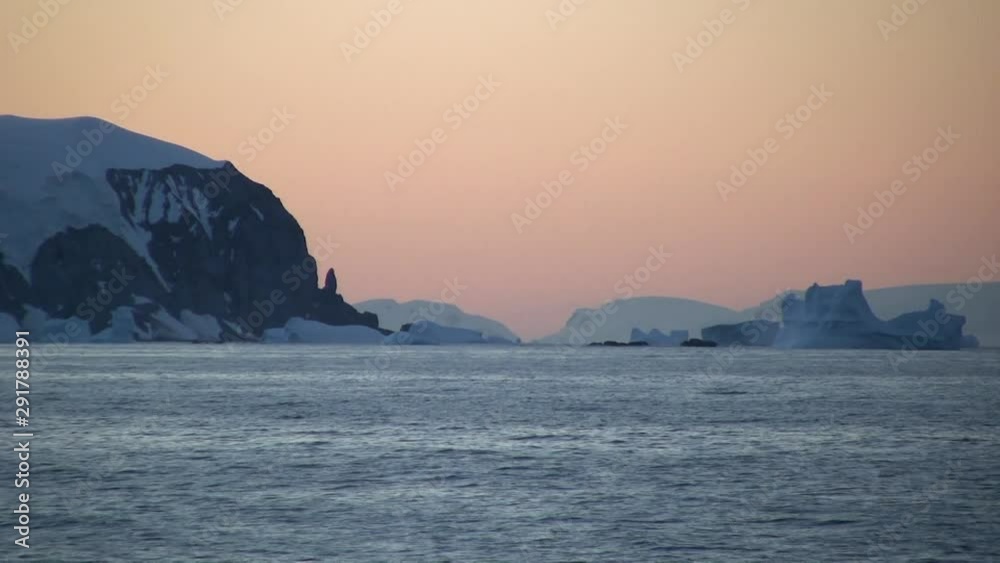 Sunset over Antarctica coastline, point of view Sunset over Antarctica coastline, point of view