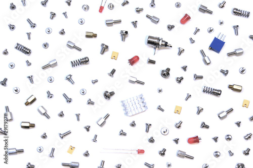 mix of bolts, screws and pins on white background